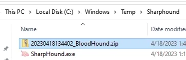 File Explorer showing the BloodHound ZIP that SharpHound wrote beside SharpHound.exe