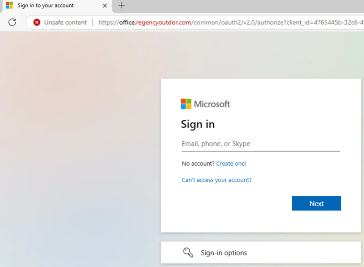 Fake Microsoft sign-in page served from office.regencyoutdor.com, flagged by the browser as unsafe content